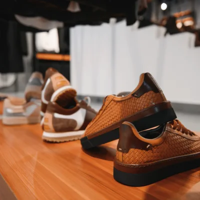 Carrucci Shoes products arranged on a retail display surface